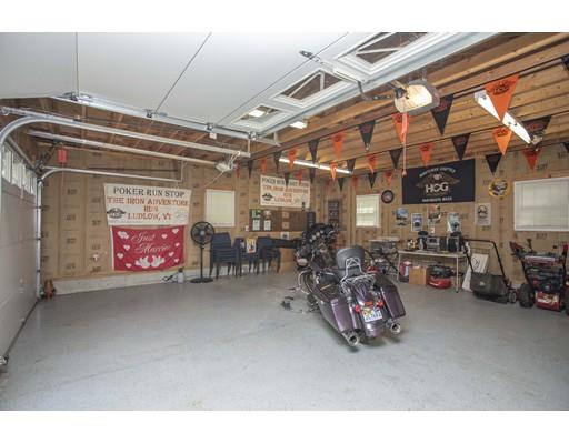121 Chipaway Road Freetown, MA 02717 - Photo 9 of 37 a view of a garage with parked cars