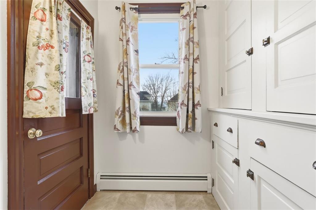 218 10th Street Aspinwall, PA 15215 - Photo 23 of 49 a bathroom with a bathtub and a shower