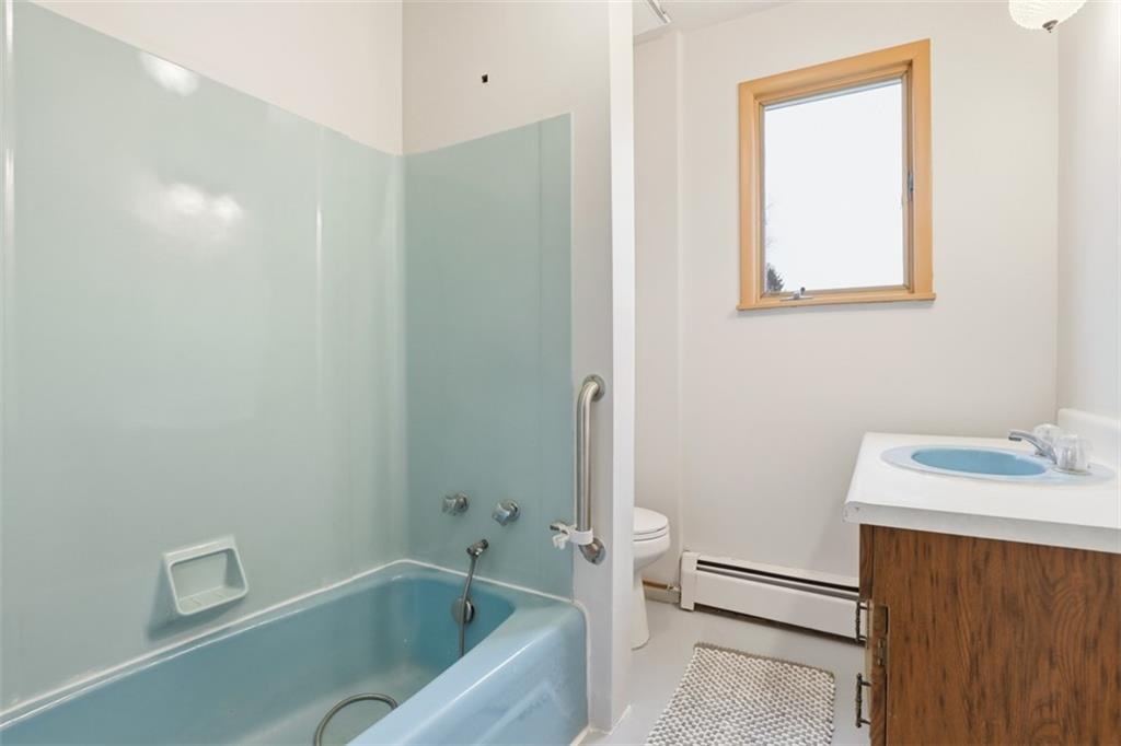 218 10th Street Aspinwall, PA 15215 - Photo 29 of 49 a bathroom with a sink and a bathtub