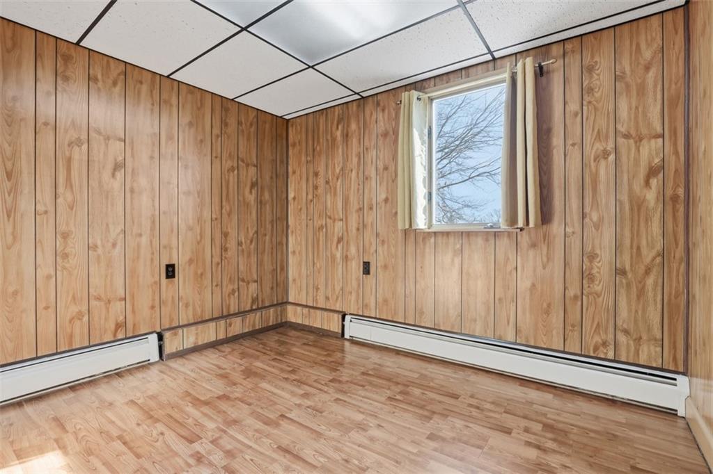 218 10th Street Aspinwall, PA 15215 - Photo 31 of 49 a view of an empty room with wooden floor