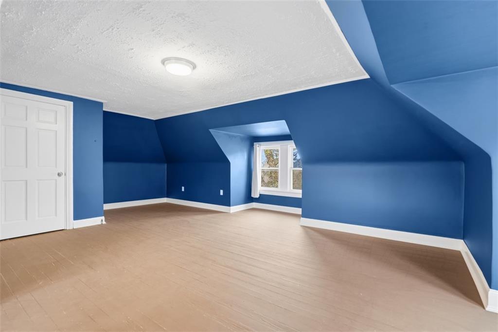 218 10th Street Aspinwall, PA 15215 - Photo 32 of 49 a view of an empty room with a window