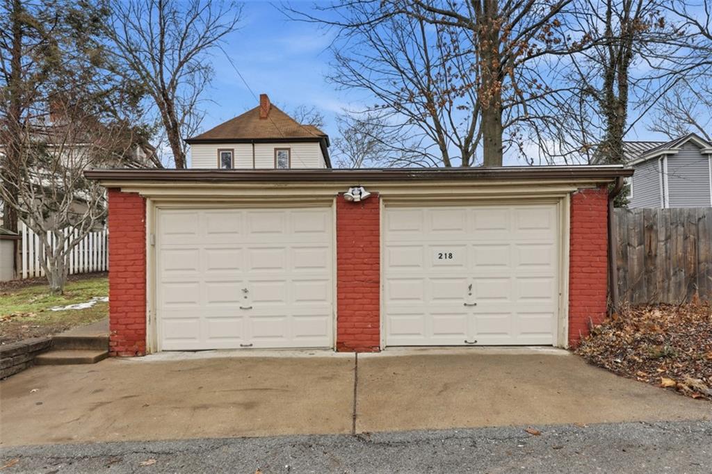 218 10th Street Aspinwall, PA 15215 - Photo 40 of 49 a front view of a house with a garage