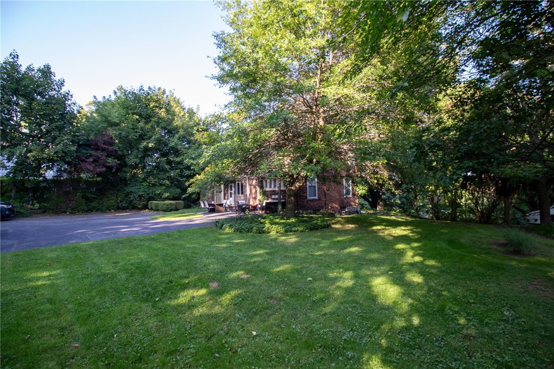 13 Cherry Street Lyons, NY 14489 - Photo 5 of 44 Back of house and parking area