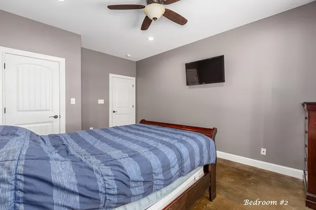 a bathroom with a sink toilet and mirror