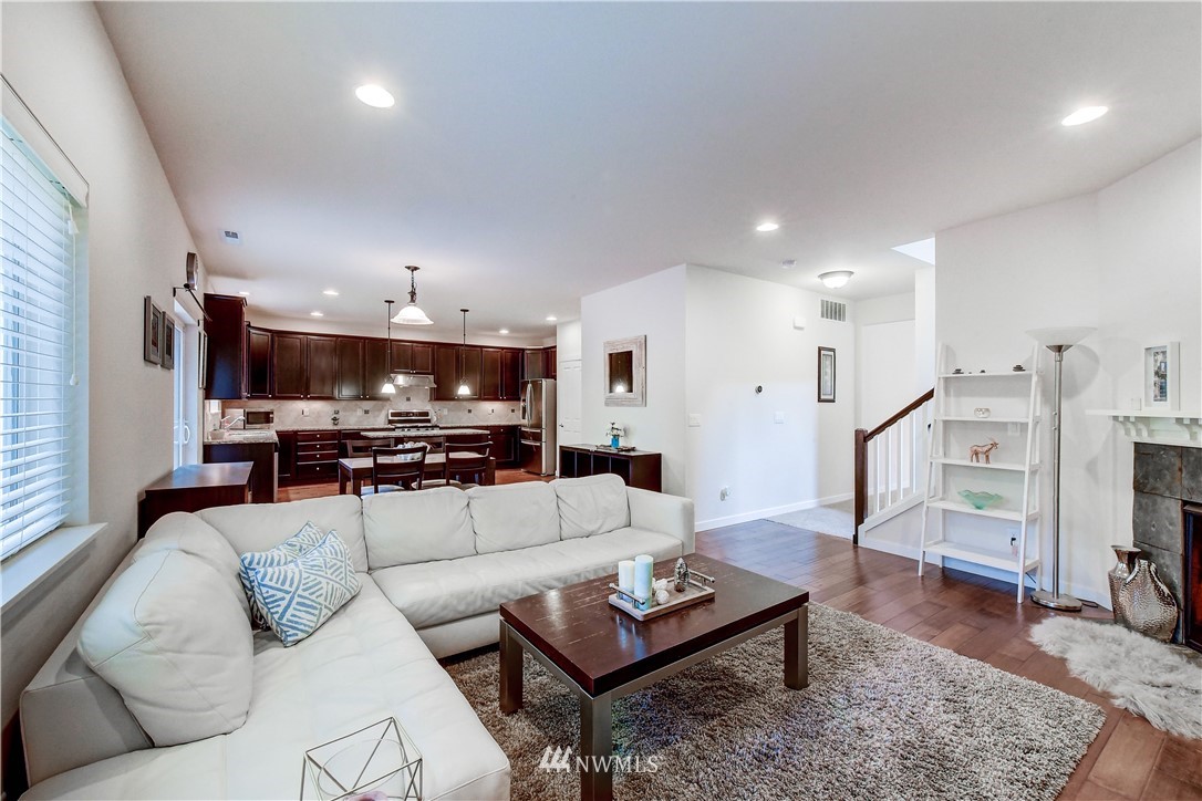 22330 35th Drive Southeast Bothell, WA 98021 - Photo 11 of 25 a living room with furniture and a flat screen tv