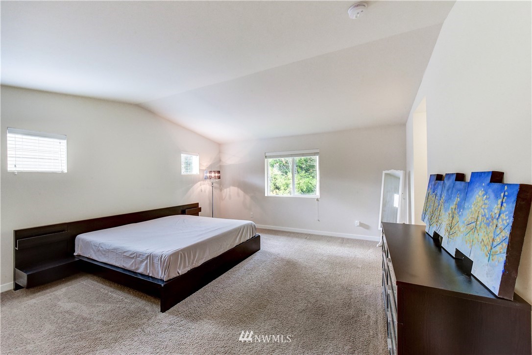 22330 35th Drive Southeast Bothell, WA 98021 - Photo 12 of 25 a a bedroom with a bed and dresser