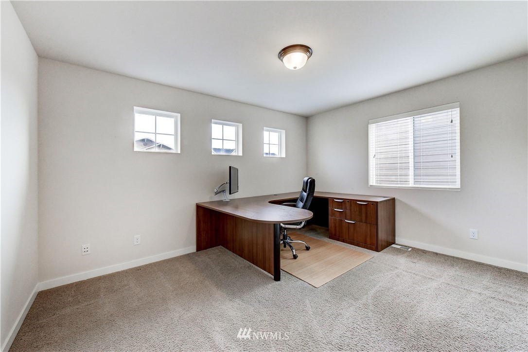 22330 35th Drive Southeast Bothell, WA 98021 - Photo 15 of 25 a room with furniture and window