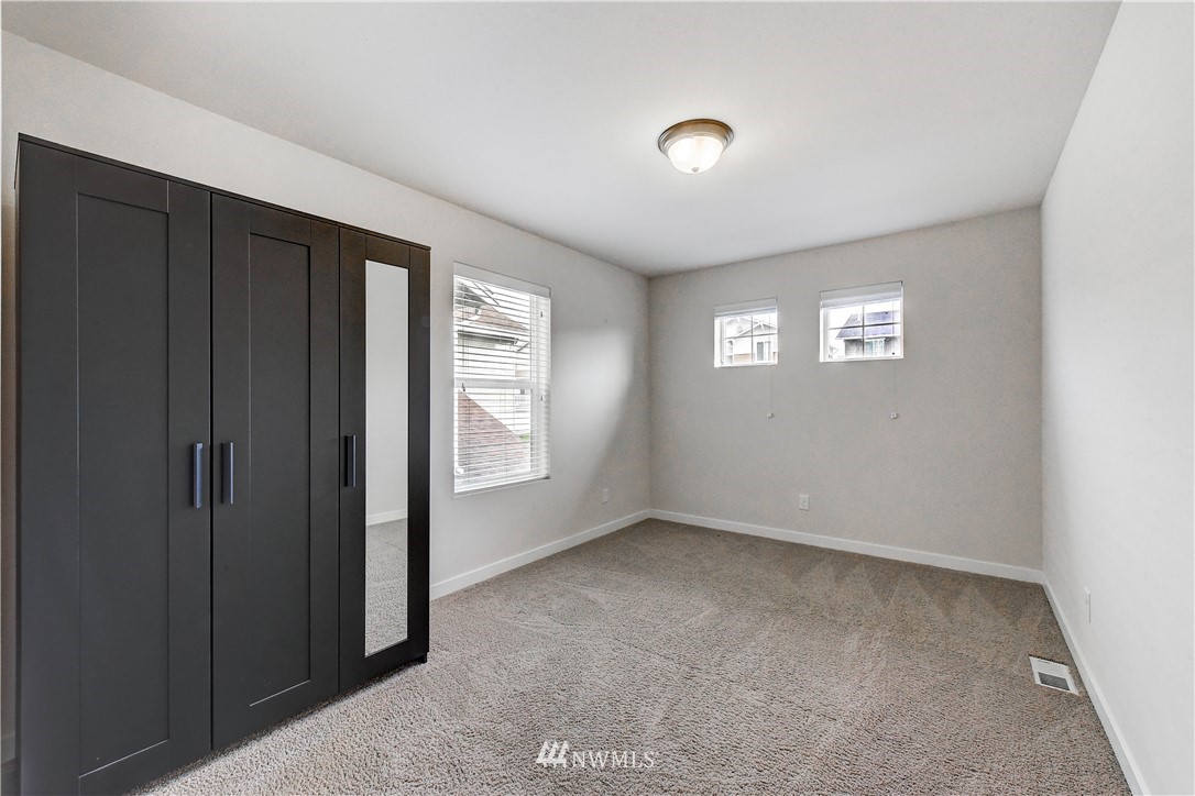 22330 35th Drive Southeast Bothell, WA 98021 - Photo 18 of 25 an empty room with windows
