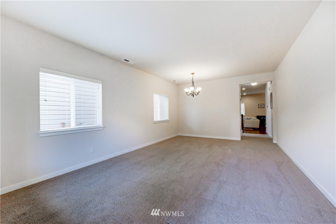 22330 35th Drive Southeast Bothell, WA 98021 - Photo 3 of 25 an empty room with a natural light