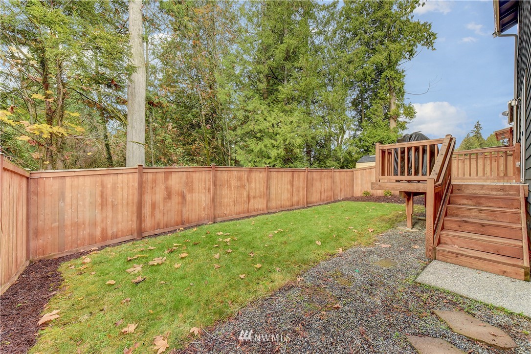 22330 35th Drive Southeast Bothell, WA 98021 - Photo 21 of 25 a view of a backyard with wooden fence