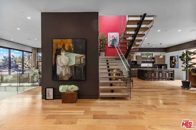 a view of a entryway door with hallway