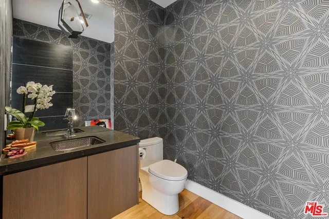 a bathroom with a toilet and a sink