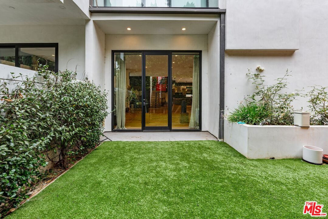 3553 Alana Drive Sherman Oaks, CA 91403 - Photo 30 of 35 front view of a house with a yard