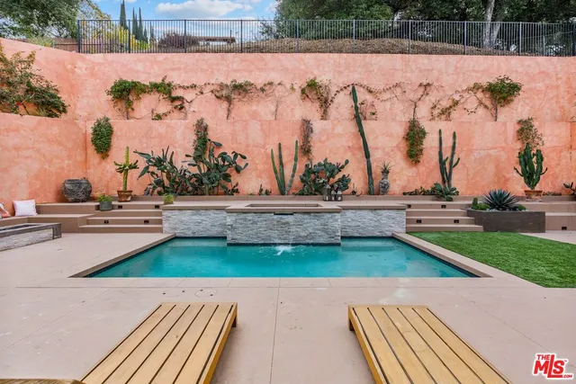 a view of park with large trees