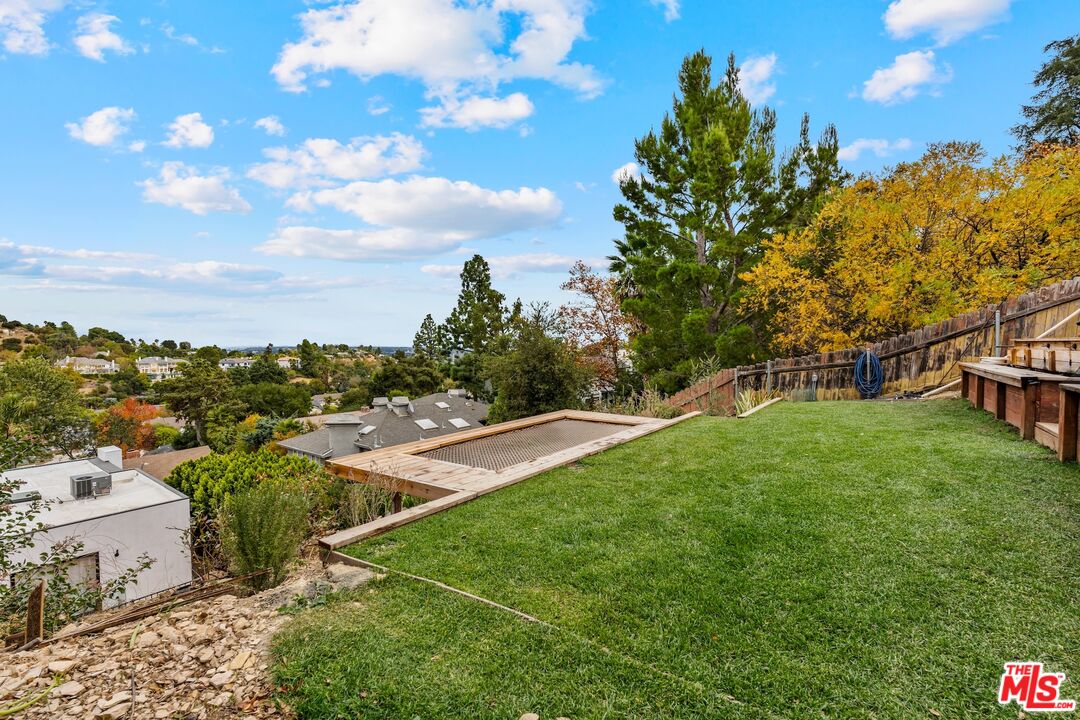 3553 Alana Drive Sherman Oaks, CA 91403 - Photo 33 of 35 a view of a house with a big yard
