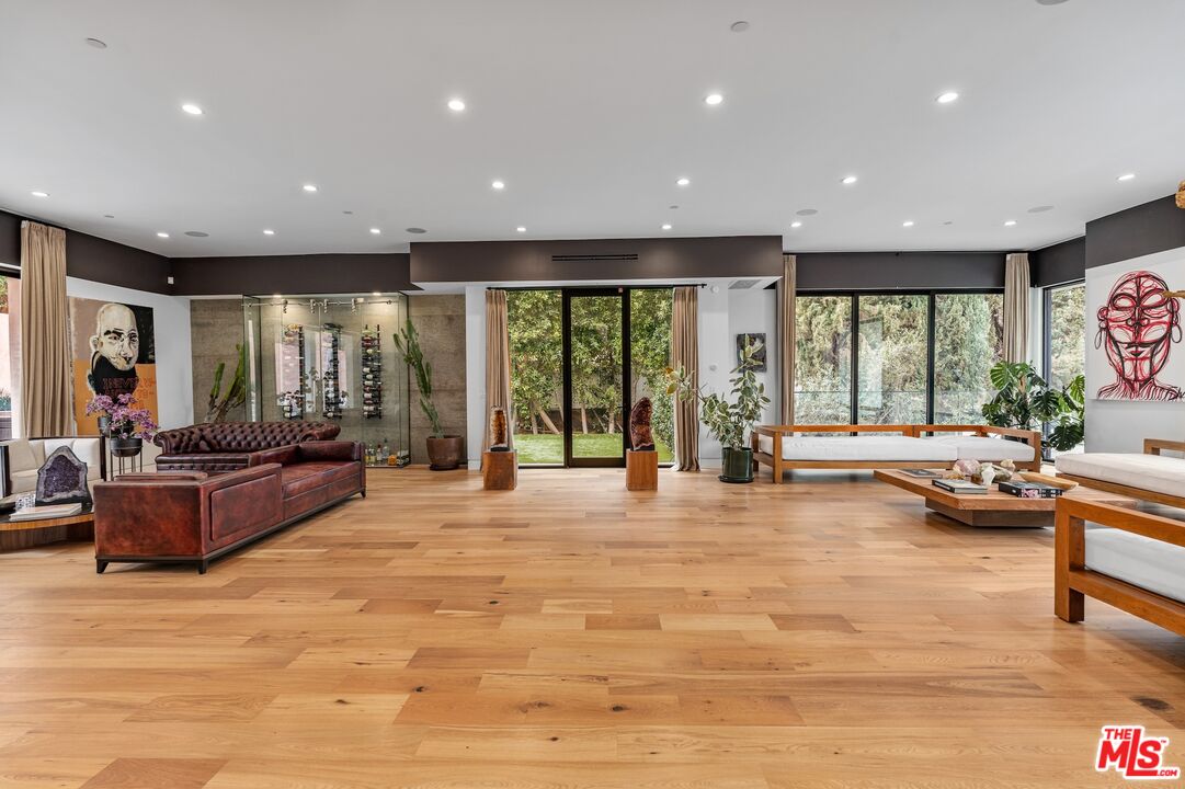 3553 Alana Drive Sherman Oaks, CA 91403 - Photo 5 of 35 a living room with furniture and a large window