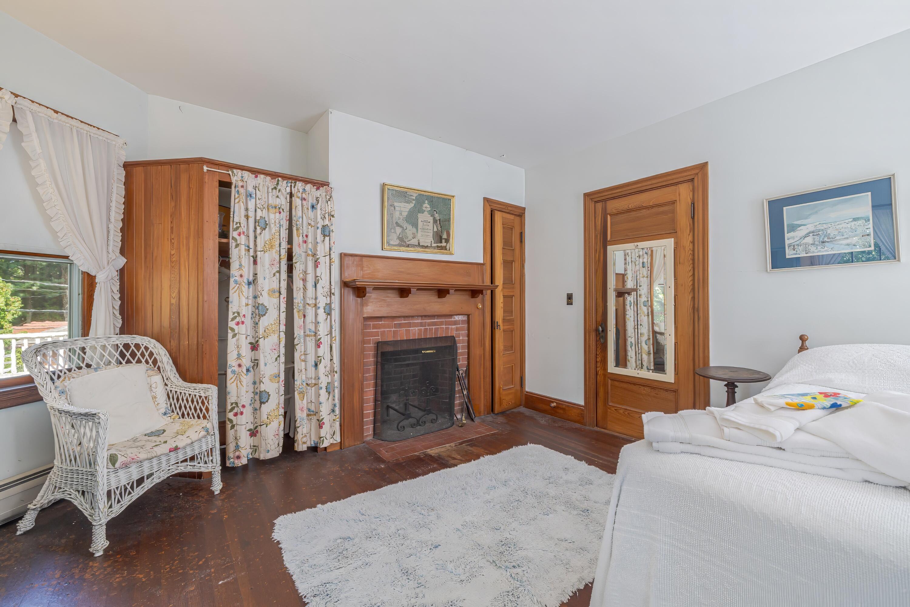 18 Rock End Road Mount Desert, ME 04662 - Photo 25 of 32 2nd floor bedroom with fireplace