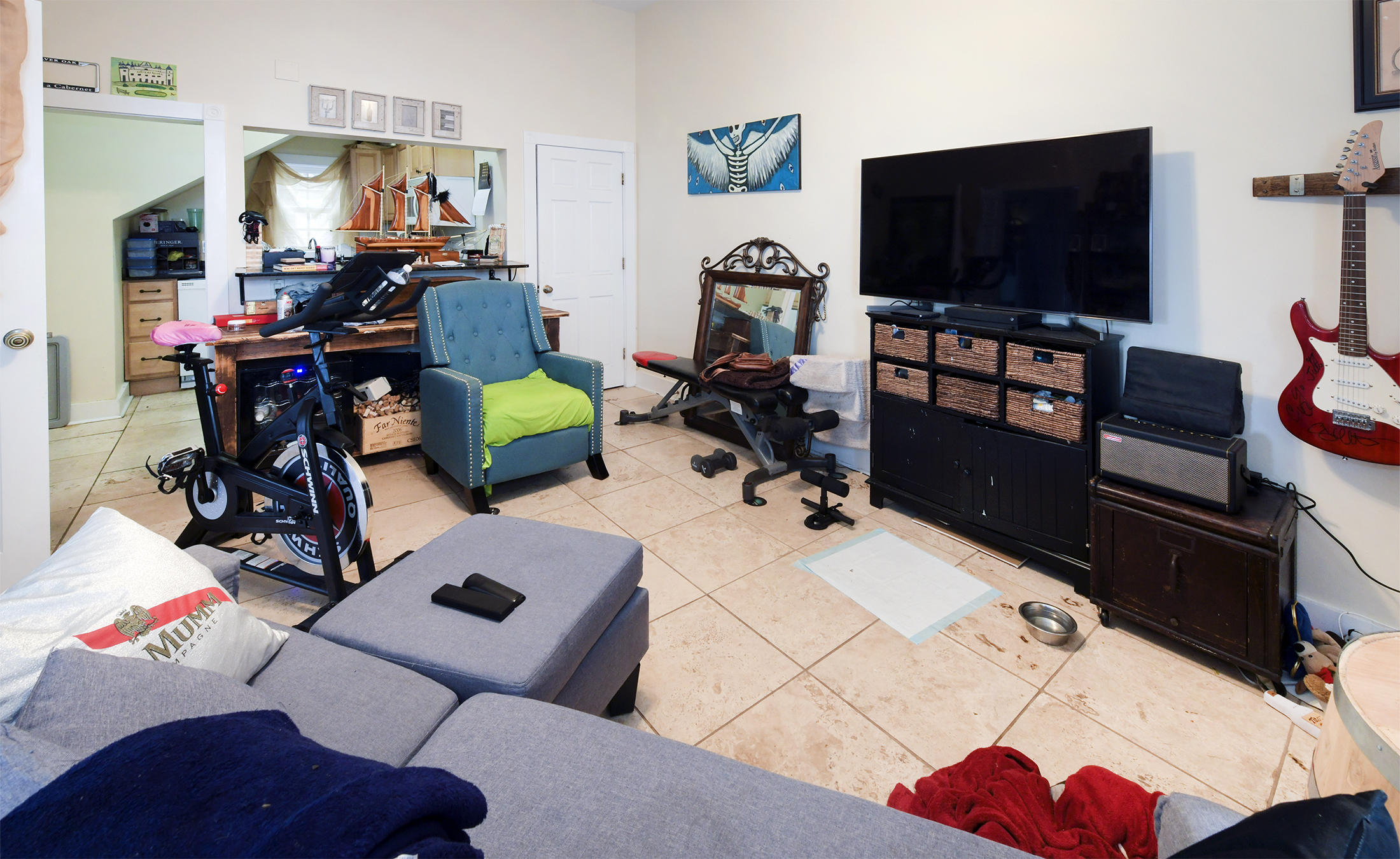 419 William Street, Unit 3 Key West, FL 33040 - Photo 2 of 12 a living room with furniture and a flat screen tv