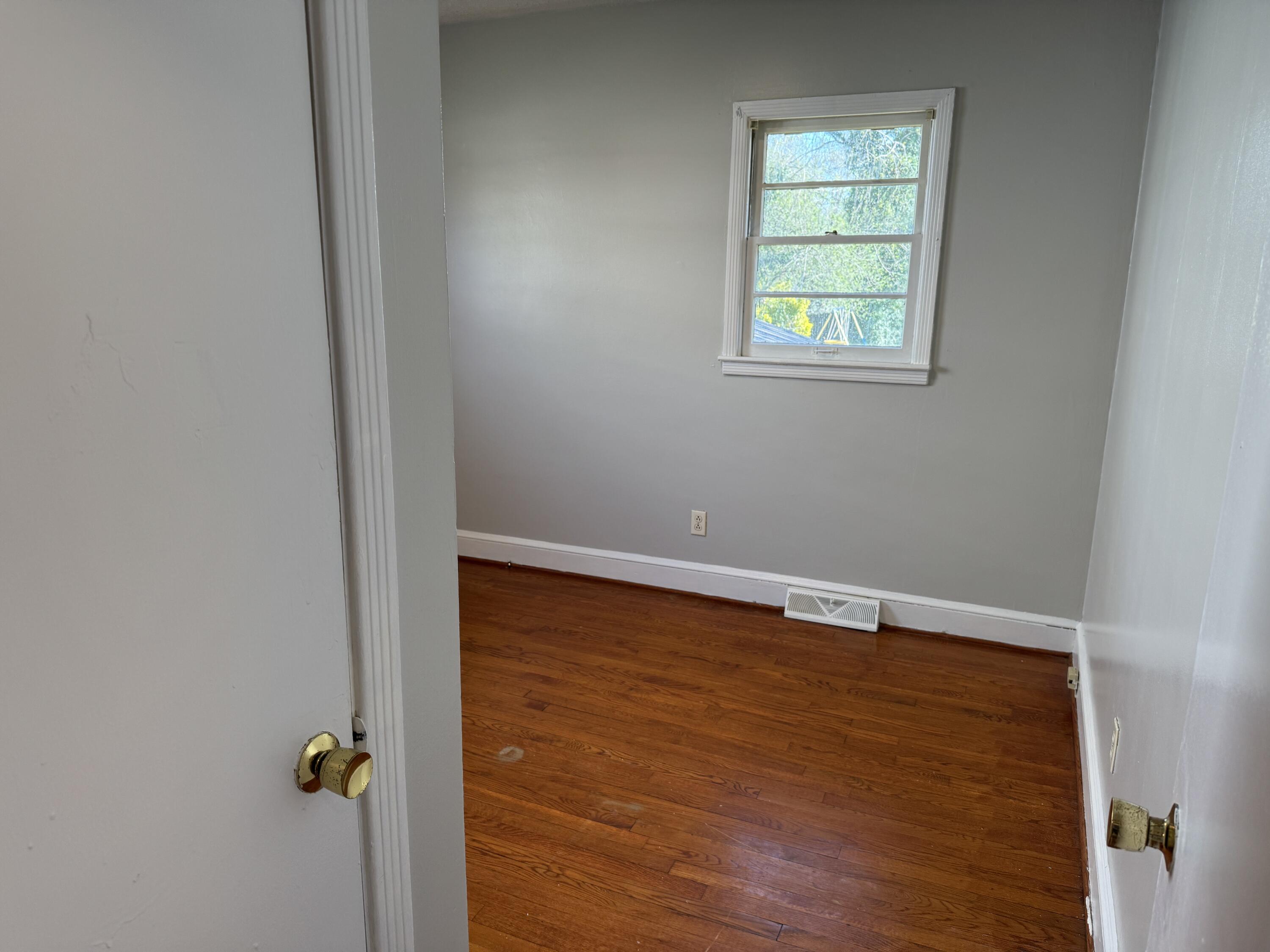 357 Terry Avenue Danville, VA 24540 - Photo 7 of 8 an empty room with windows