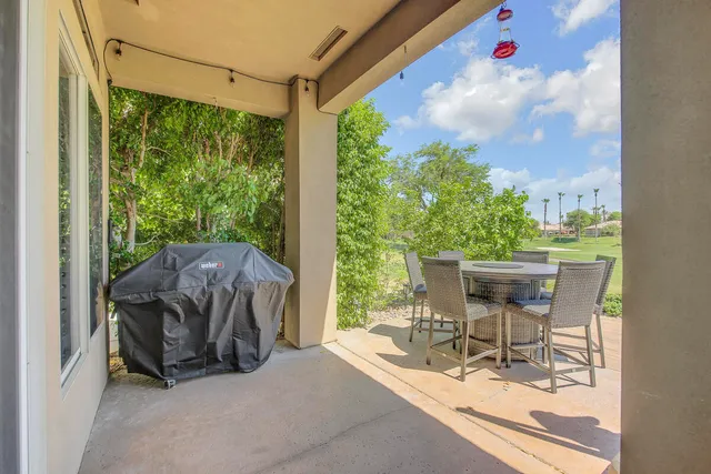 a outdoor living space with furniture and garden view