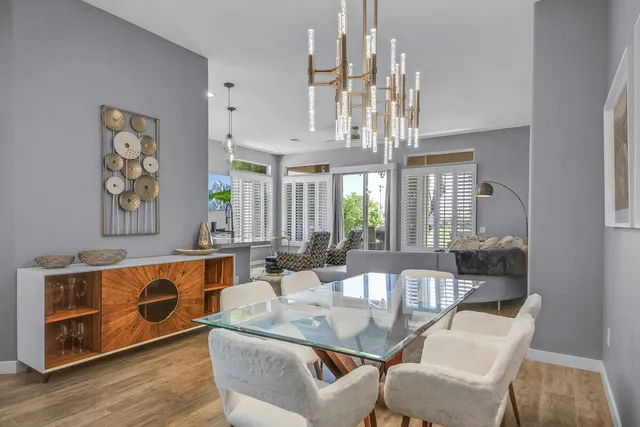 a view of room with furniture and wooden floor