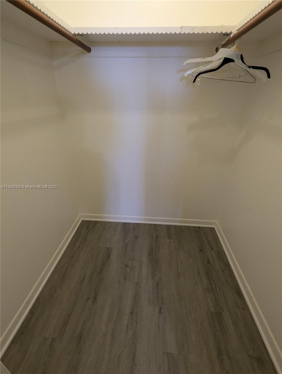 4047 Northwest 16th Street, Unit 403 Lauderhill, FL 33313 - Photo 24 of 30 a view of a room with shelf