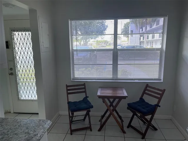 a stove top oven sitting inside of a kitchen