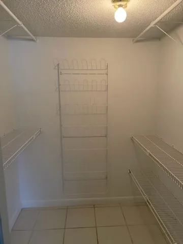 a view of a room that has a window in it