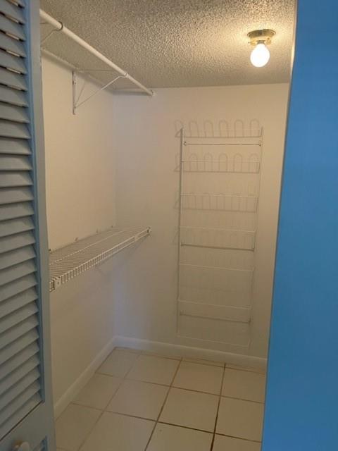 8405 Northwest 61st Street, Unit D109 Tamarac, FL 33321 - Photo 20 of 25 a view of a room with racks on the wall
