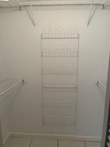 a view of a kitchen from the hallway