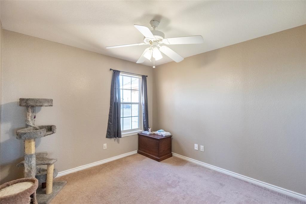 2166 County Road 131 Tuscola, TX 79562 - Photo 17 of 40 a view of an empty room with a window