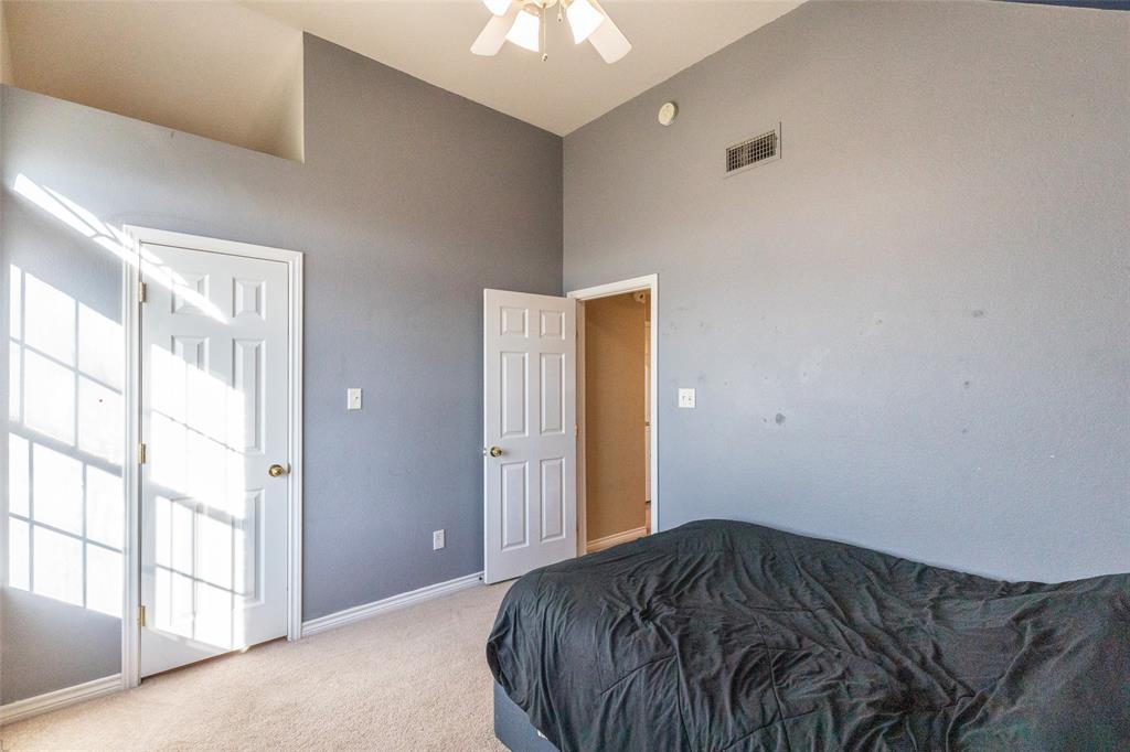 2166 County Road 131 Tuscola, TX 79562 - Photo 20 of 40 a bedroom with a bed and a window