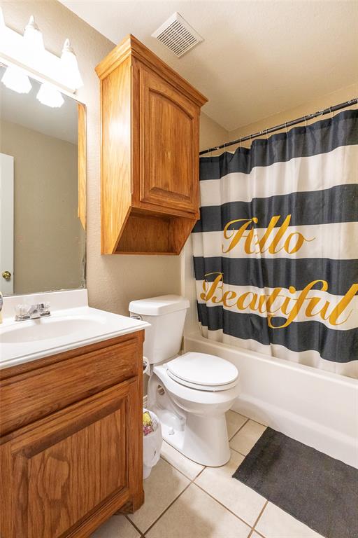2166 County Road 131 Tuscola, TX 79562 - Photo 22 of 40 a bathroom with a sink and a mirror