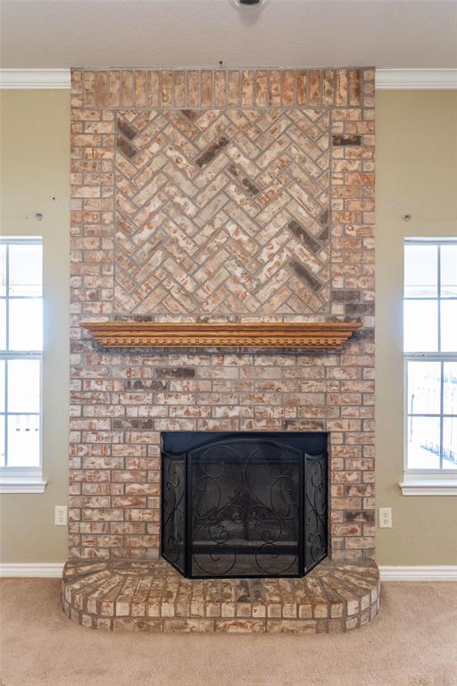 2166 County Road 131 Tuscola, TX 79562 - Photo 8 of 40 a living room with a fireplace