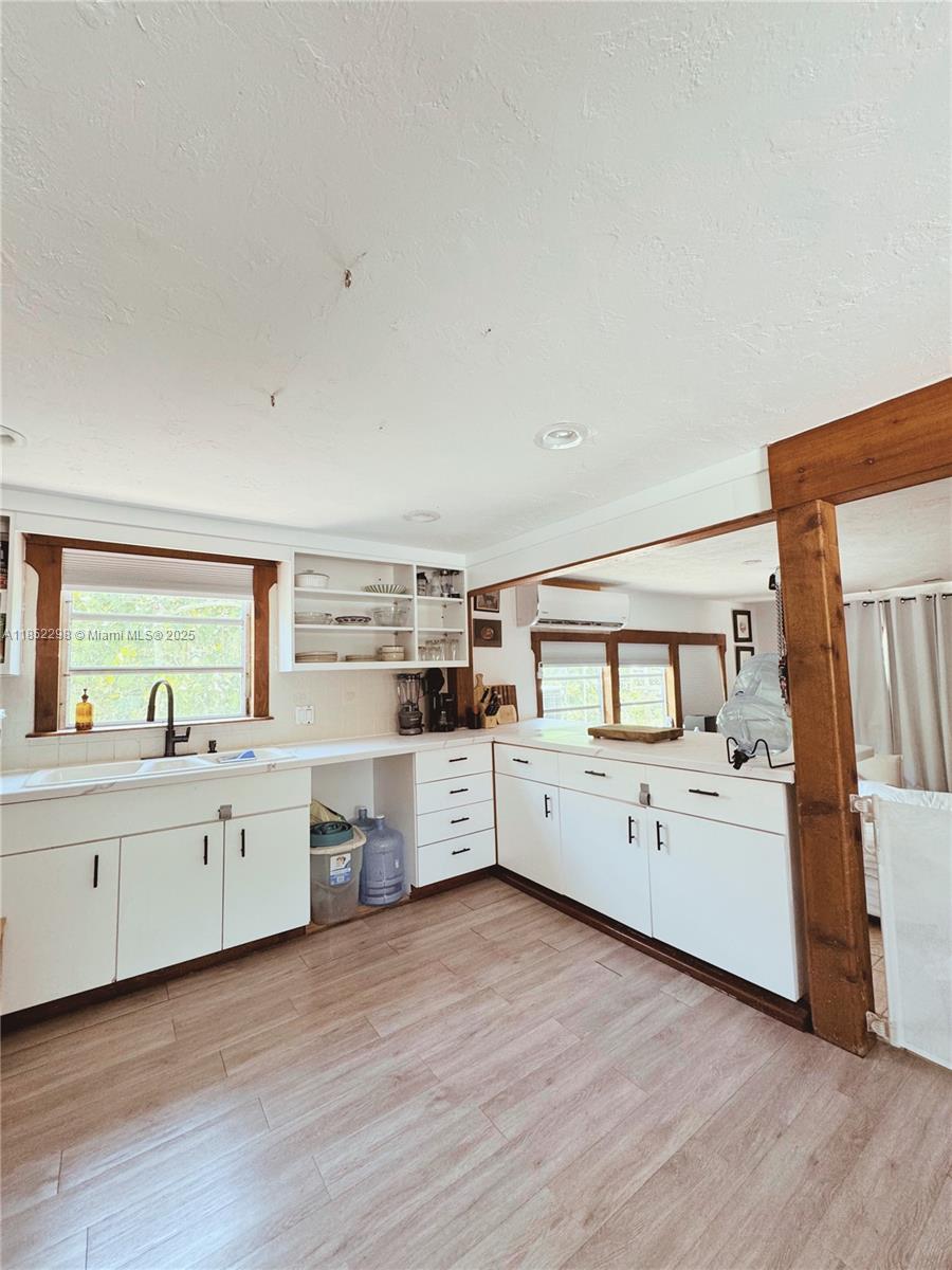 2231 Middle Torch Road Summerland Key, FL 33042 - Photo 22 of 33 a room with furniture and wooden floor