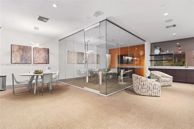 a living room with furniture and a table