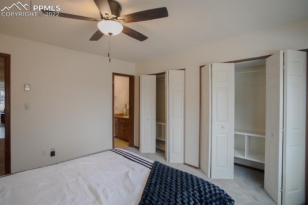 1140 Magic Lamp Way, Unit 3 Monument, CO 80132 - Photo 21 of 26 a view of room with window and ceiling fan