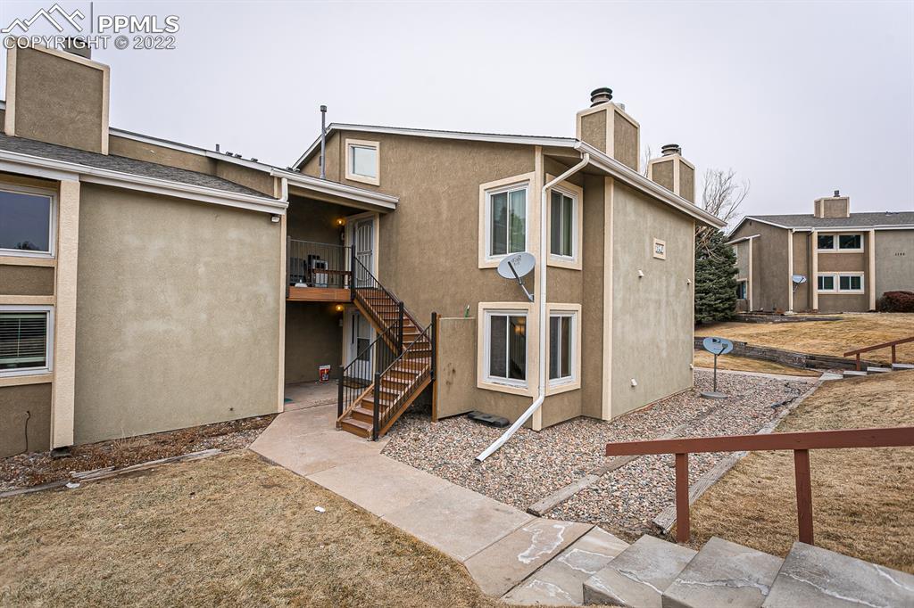 1140 Magic Lamp Way, Unit 3 Monument, CO 80132 - Photo 26 of 26 a view of a house with a patio