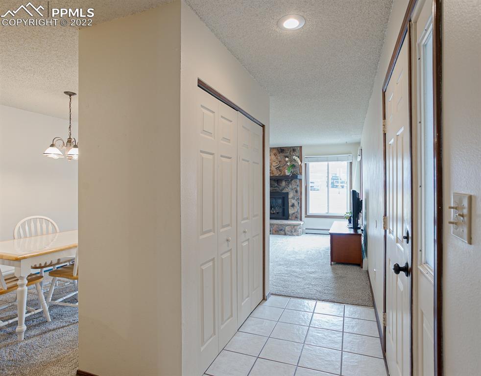 1140 Magic Lamp Way, Unit 3 Monument, CO 80132 - Photo 5 of 26 a view of a livingroom with furniture and windows