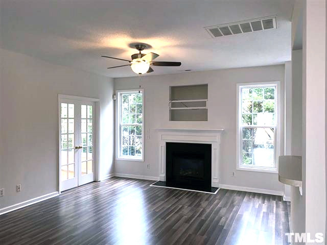 1928 Cartier Ruby Lane Raleigh, NC 27610 - Photo 7 of 17 Familt room with new laminate flooring