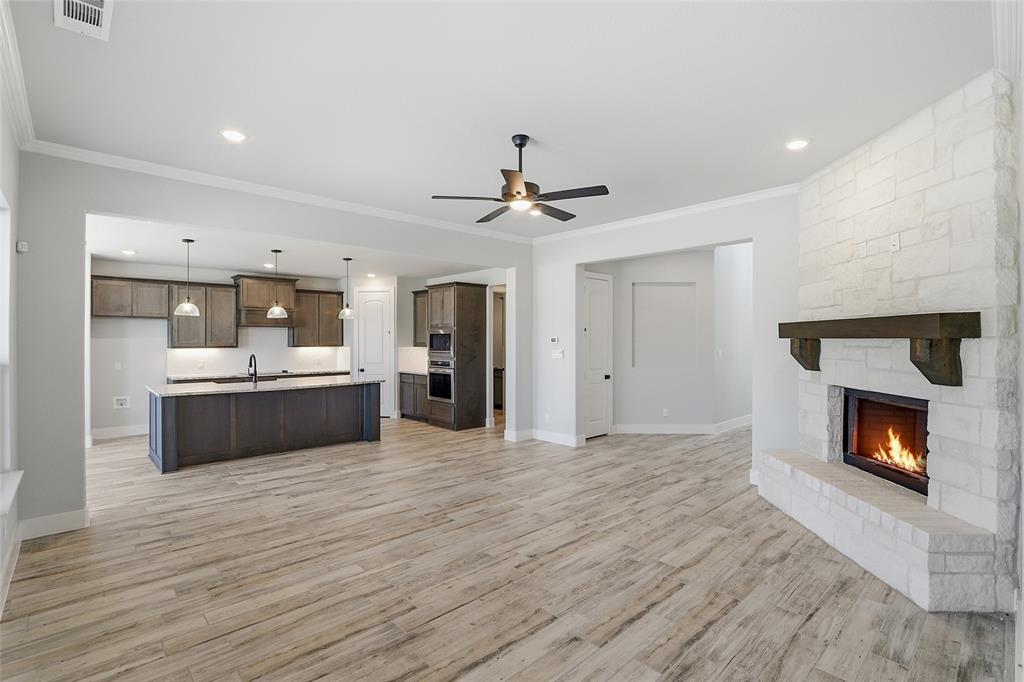 290 Cofer Road Leonard, TX 75452 - Photo 18 of 40 a view of kitchen with a sink and a fireplace