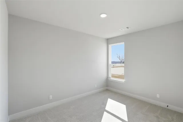 a bathroom with a sink mirror toilet and bathtub