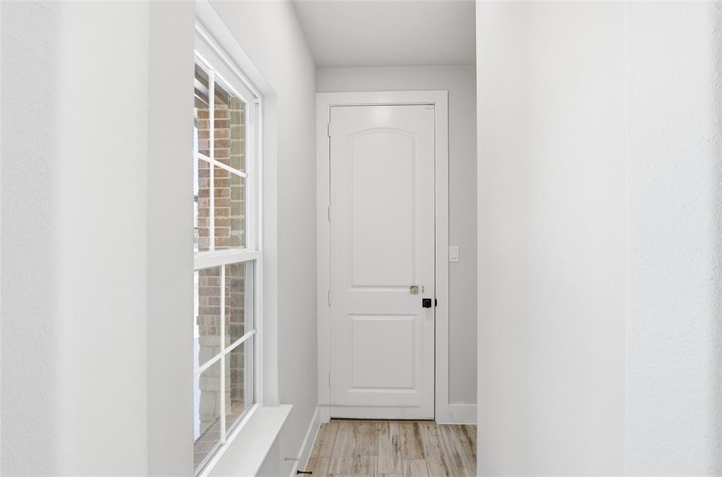290 Cofer Road Leonard, TX 75452 - Photo 37 of 40 a view of front door with wooden floor