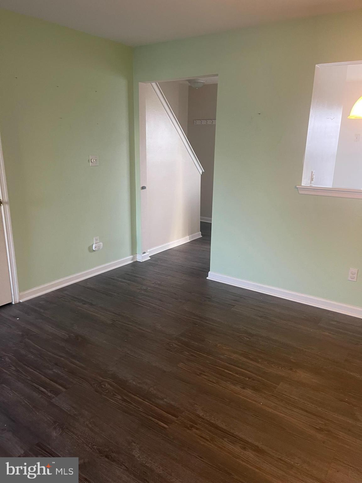 332 Liborio Drive Middletown, DE 19709 - Photo 14 of 46 a view of an empty room with wooden floor