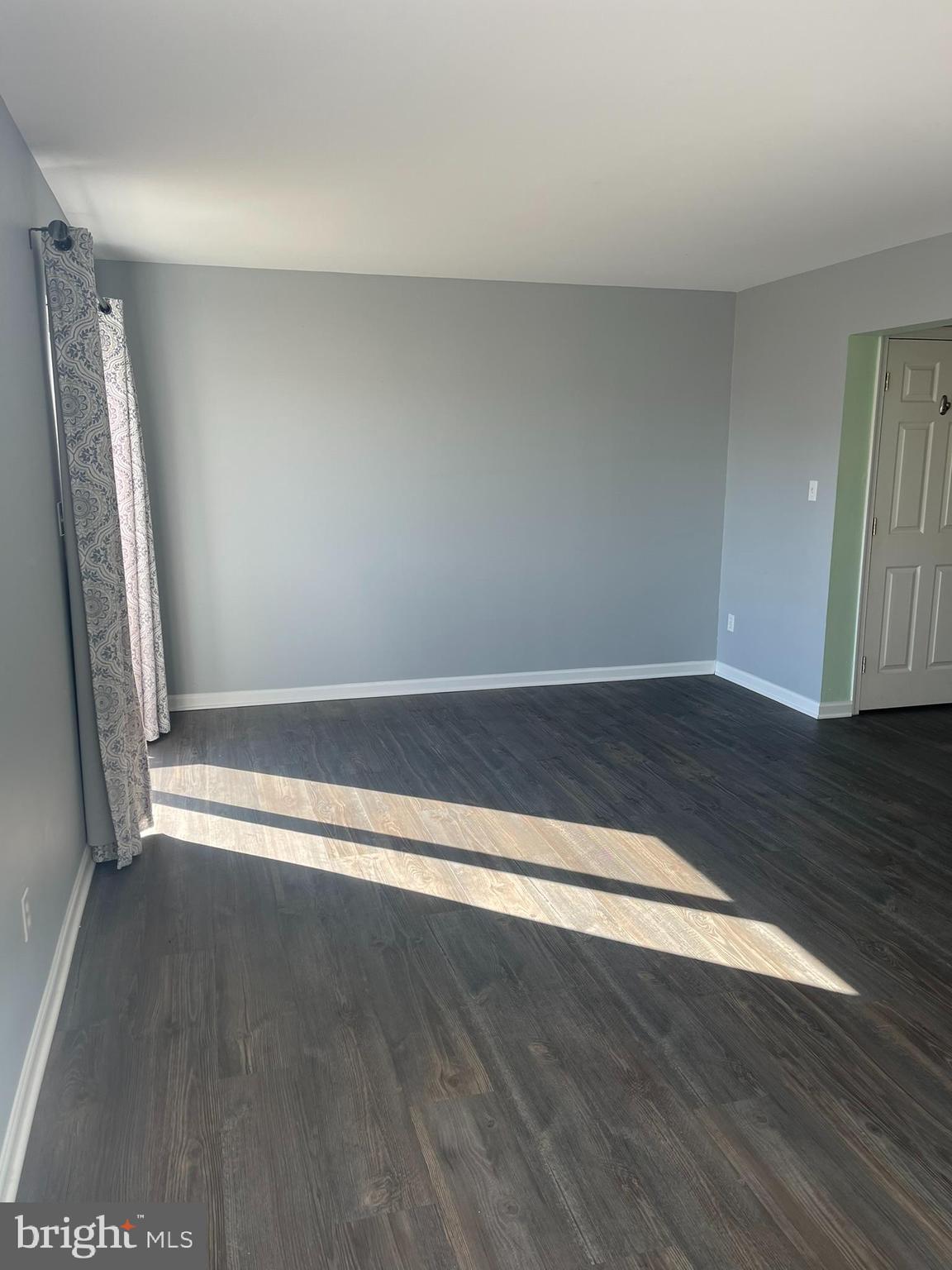 332 Liborio Drive Middletown, DE 19709 - Photo 19 of 46 a view of room with wooden floor and staircase