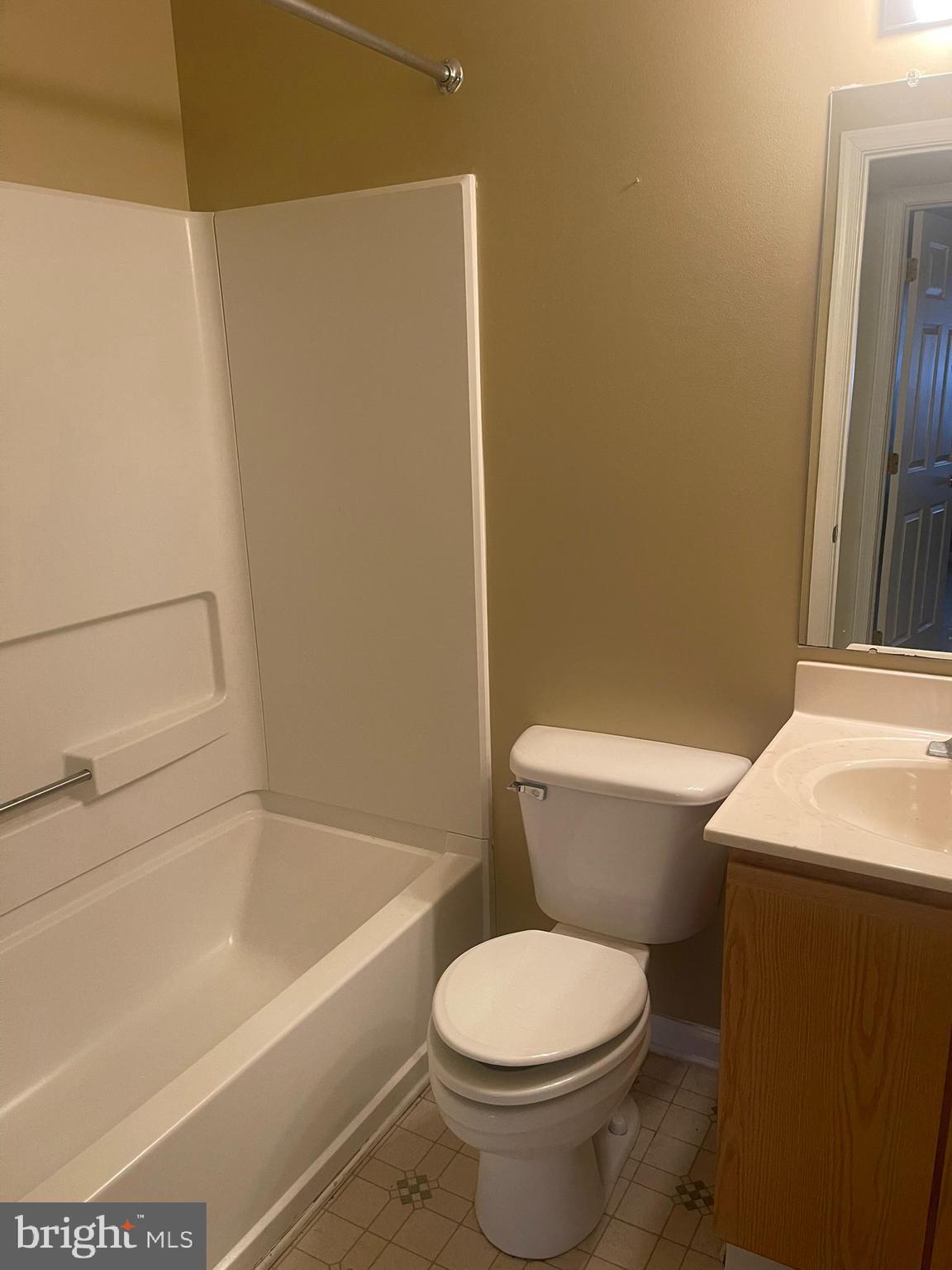 332 Liborio Drive Middletown, DE 19709 - Photo 31 of 46 a white toilet sitting next to a bath tub