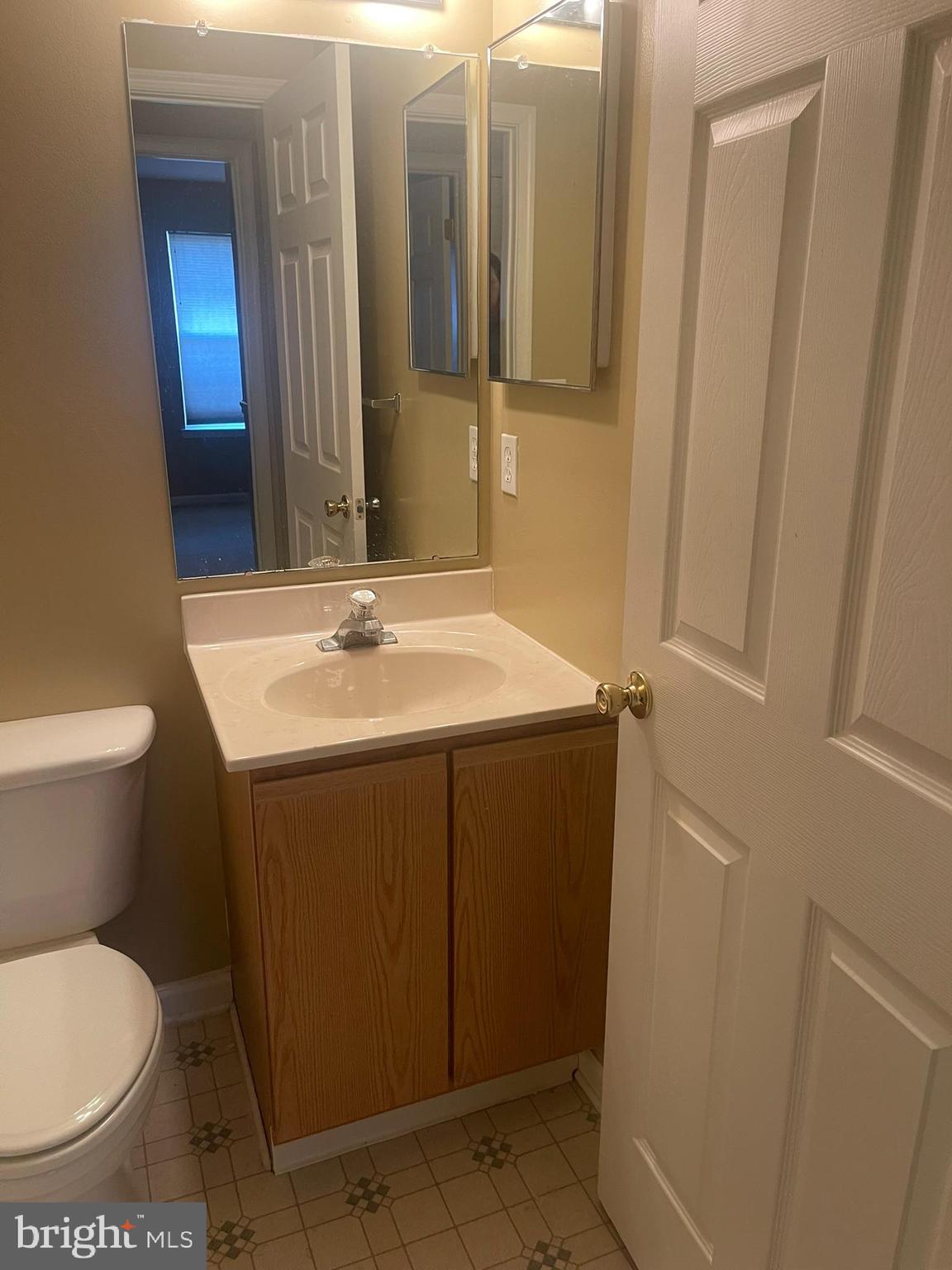 332 Liborio Drive Middletown, DE 19709 - Photo 33 of 46 a bathroom with a sink toilet and mirror