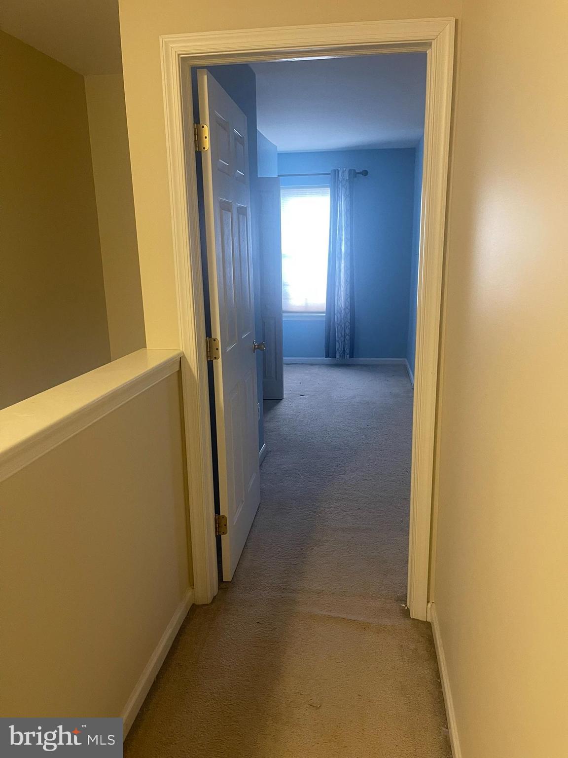 332 Liborio Drive Middletown, DE 19709 - Photo 35 of 46 a view of a hallway with wooden floor