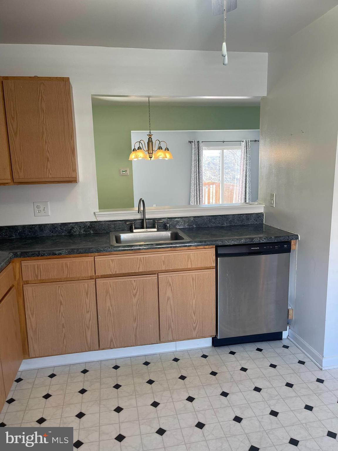 332 Liborio Drive Middletown, DE 19709 - Photo 5 of 46 a kitchen with granite countertop a sink and a stove