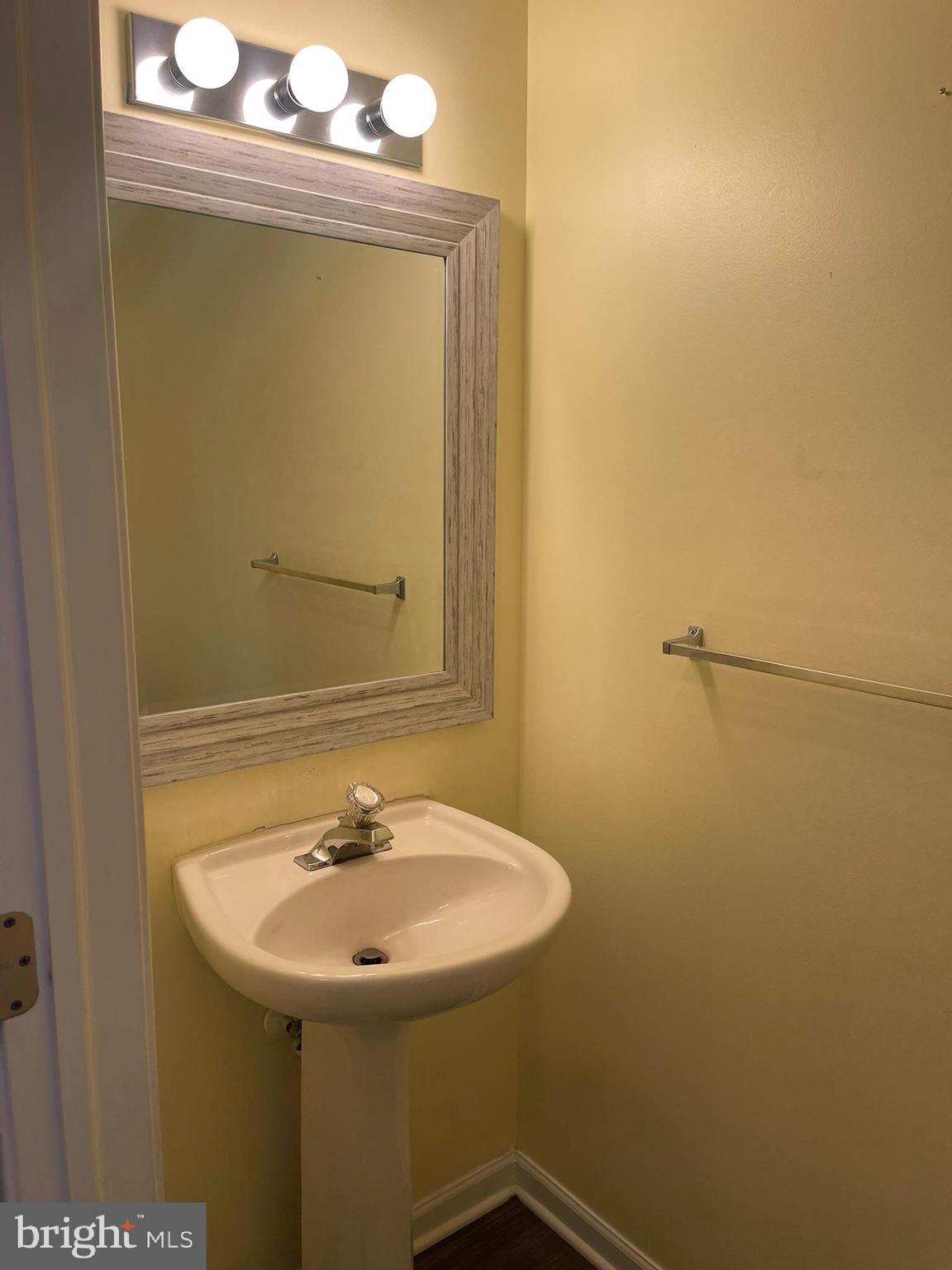 332 Liborio Drive Middletown, DE 19709 - Photo 9 of 46 a bathroom with a sink and a mirror